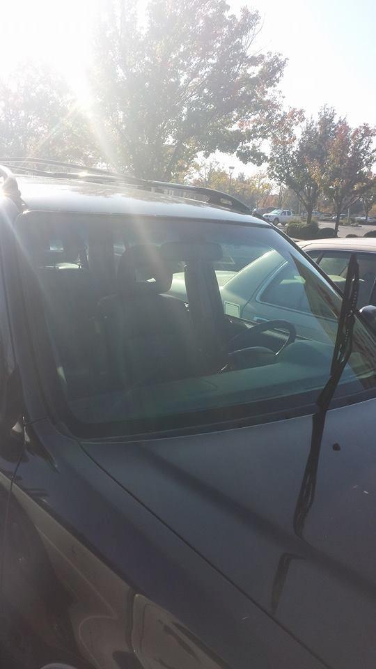 Before a completed auto glass repair shop project in the area