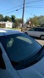 After a completed auto glass replacement project in the area